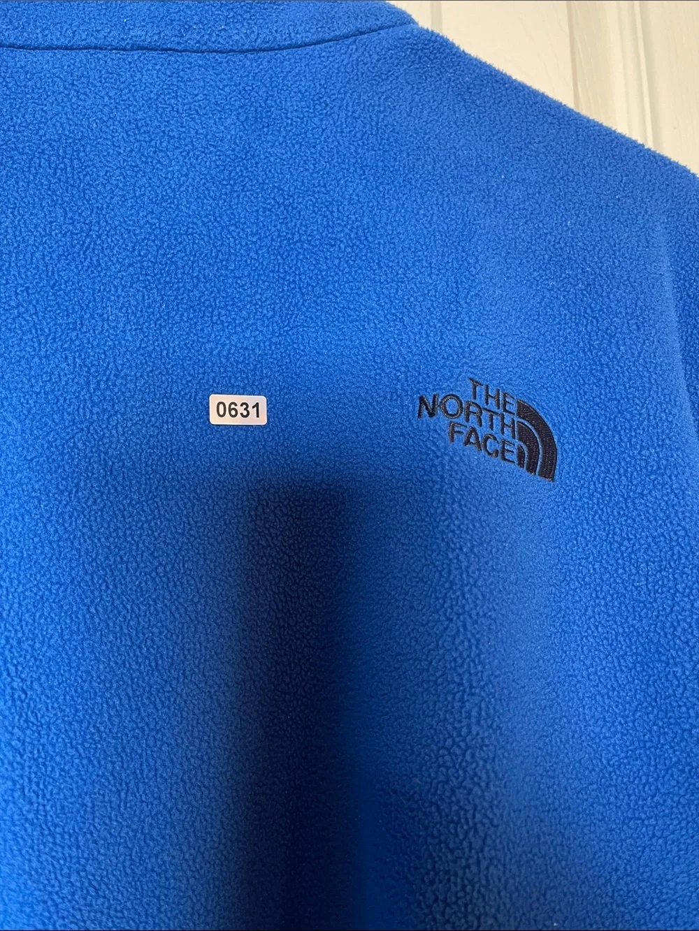 The North Face Men's Royal Blue Fleece Jacket with Black Elbow Panels
